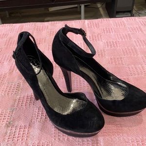 Black suede pumps